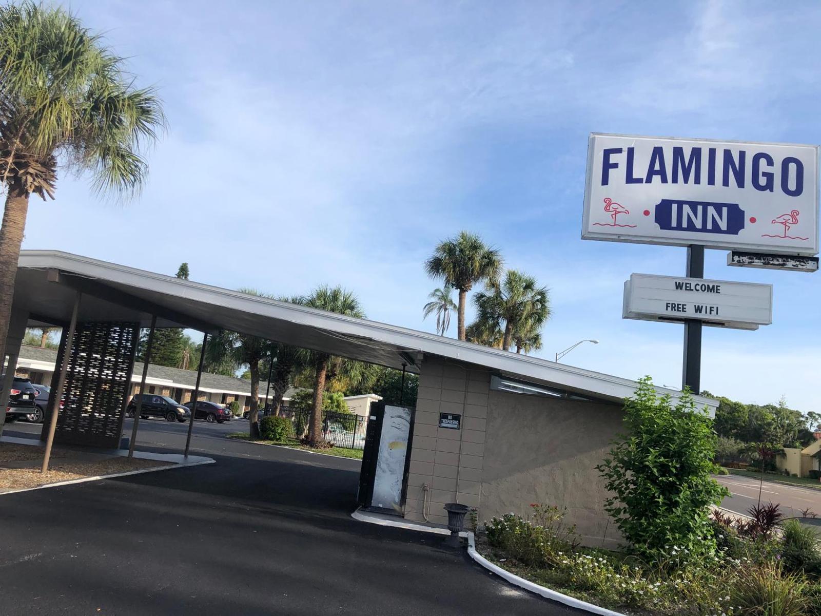 Flamingo Inn Sarasota exterior entrance and roadside sign