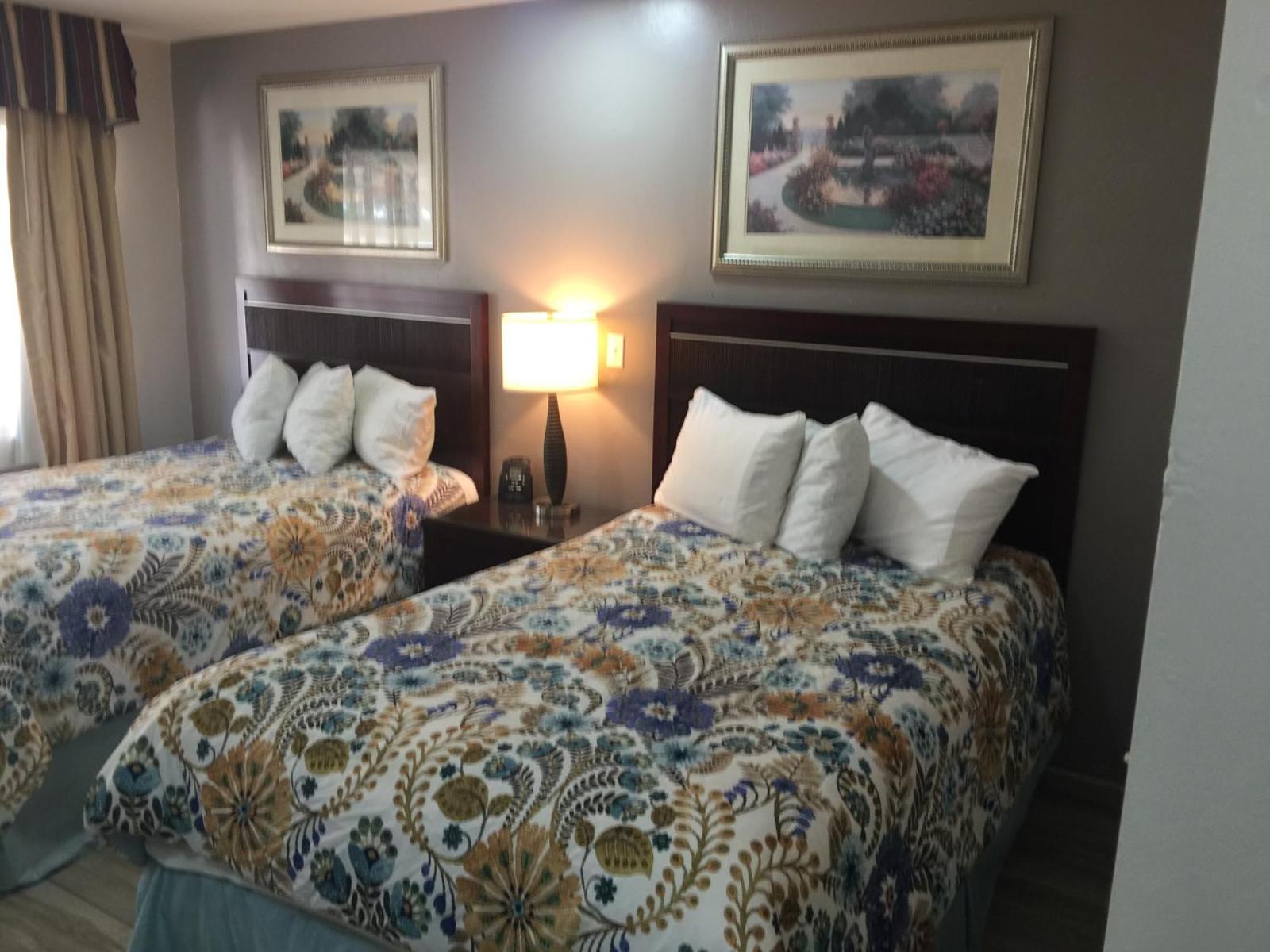 Flamingo Inn Sarasota guest room with two beds